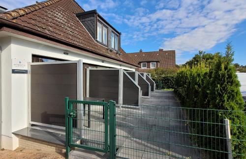 Hochwertige Ferienwohnung in ruhiger Lage mit eigener Terrasse und Parkplatz, nur 7 Gehminuten zum Strand entfernt - hoher Schlafkomfort dank Boxspringbett - Foto 20