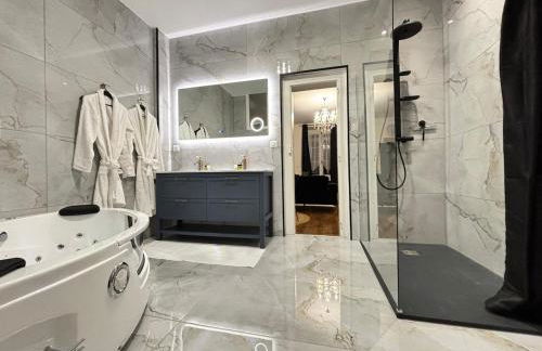 Appartement 1 Climatisé Séjour inoubliable,détente,bain-bulle,un coin de paradis ainsi qu'une terrasse au rdc - Foto 2