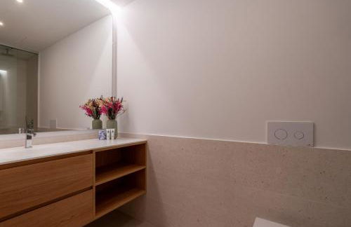 Sleek & Modern Flat w/ Private Garage by HostWise - Photo 23