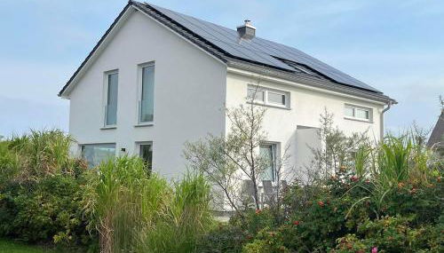 HausLIEBLINGSPLATZ - am Meer - Luxus Villa mit 4 Schlafzimmern, 3 Badezimmern Sauna, Kamin, Weber-Grill und Wallbox - Foto 5