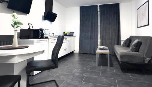 Kassel - Modernes Apartment in Fuldatal mit Parkplatz & WLAN - OneN8 - Photo 4, stove, toaster