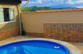 Casa Espaço Sara Piscina com total privacidade, área gourmet completa com churrasqueira fogão a lenha, a 5min do centro e do parque das águas - Foto 44