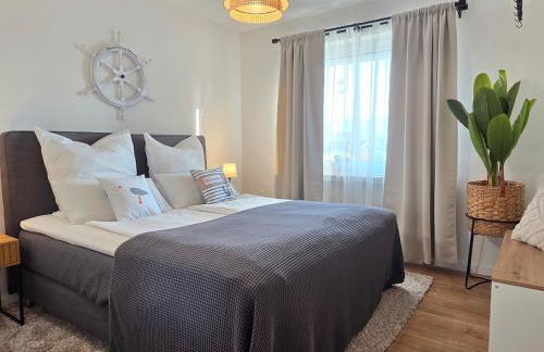 Seensucht - Maritimes Apartment mit Seeblick & Balkon, 500 m zum See - Photo 1