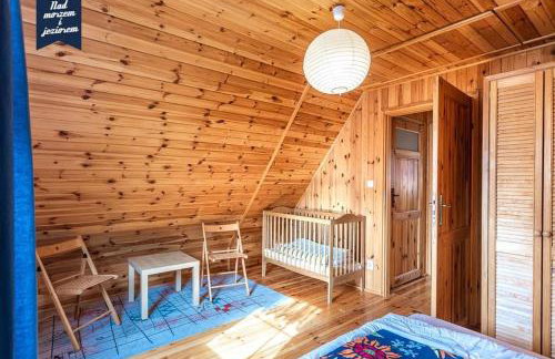CAŁOROCZNE DOMKI NAD MORZEM I JEZIOREM - Foto 9