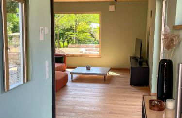 Amber Ferienhain - Ferienhaus 'Magnolie' mit verwunschenem Garten & privater Sauna - Foto 4