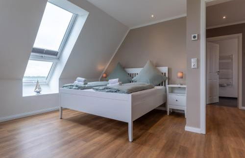 Doppelhaushalfte in Karolinenkoog - Foto 32