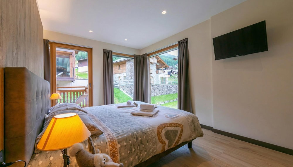 Casa Luminosa Ski in -Ski out 100m - Happy Rentals - Foto 1, Habitación