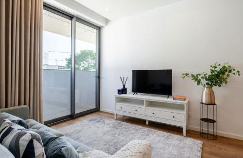 Sleek & Modern Flat w/ Private Garage by HostWise - Photo 16