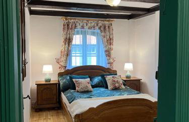 Apartament w XIX-wiecznym Spichlerzu nad Jeziorem z dostępem do parku i widokiem na Dworek Modrzewiowy z 1823 roku - Foto 13