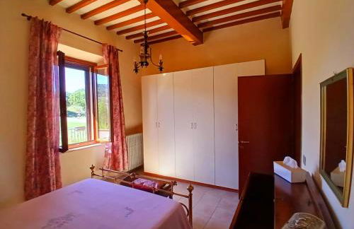 INCANTEVOLE CASA TOSCANA con travi in legno, ampia terrazza e vista sulle colline - Foto 17