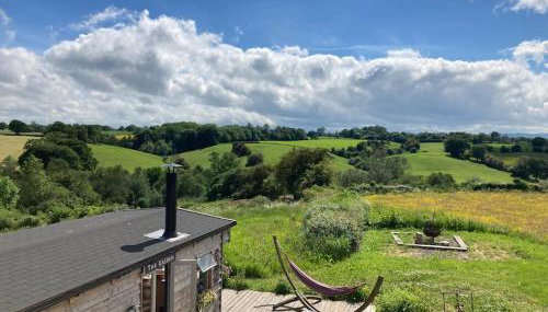 A charming unique lodge, with log burner and incredible views - Foto 1