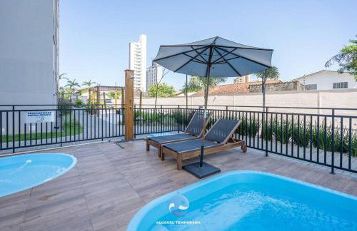 Apartamento a 150 M DA PRAIA com SACADA, WI-FI, PISCINA, PORTARIA 24h, PLAYGROUND e vaga de GARAGEM - Photo 4