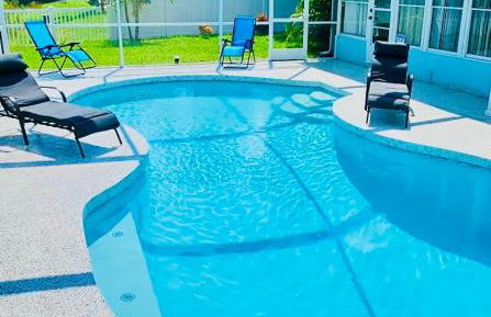NEW Renovated luxury home with private heated pool, game room Near Anna Maria Island and IMG - Photo 1