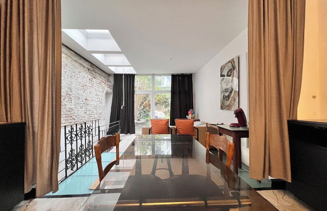 Chic Comfortable Loft and Natural Light - Photo 18