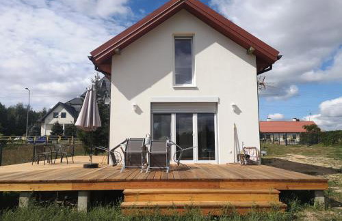 Dom nad jeziorem z prywatnym pomostem i linią brzegową - Foto 3