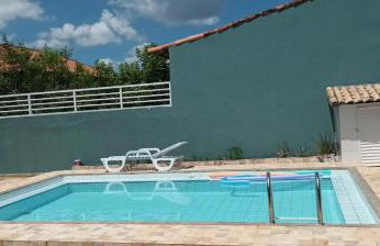 Casa com piscina em Condomínio - Foto 1