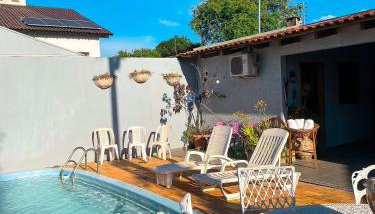 Casa com 2 suites e 1quarto piscina Ar para 8 hospedes - Foto 3