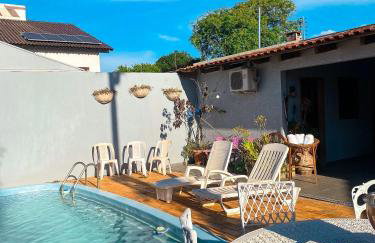 Casa com 2 suites e 1quarto piscina Ar para 8 hospedes - Foto 3