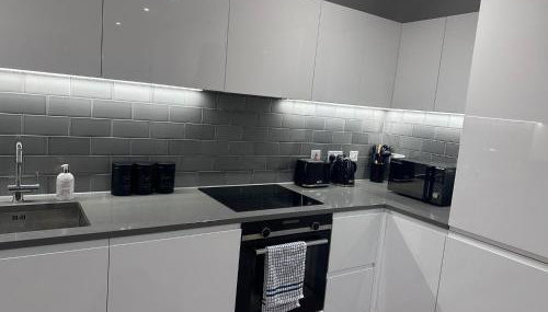 2 Bed Apartment - Photo 2, stove, dishwasher, toaster