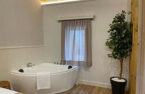 Goninos Jacuzzi Suite - Foto 10