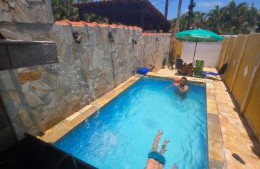 Casa com Piscina Aquecida, Churrasqueira e Wi-fi, lado praia de Itanhaém - Foto 7