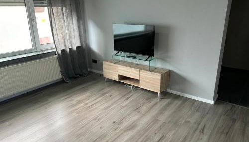 Gemütliche Ferienwohnung mit 1 Schlafzimmer, Wohnzimmer mit Schlafcouch & voll ausgestattete Küche - Foto 3