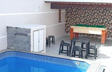 "Lindíssima Casa Pé na Areia com Opção da Piscina Aquecida Cobrado a Parte, Sala de Jantar, 3 Amplos Quartos, Sendo1Suíte, Amplo Espaço de Lazer com Área Gourmet em Deck Coberto com Churrasqueira e Mesa de Bilhar Frente a Piscina, Super Pertinho da Praia" - Photo 13