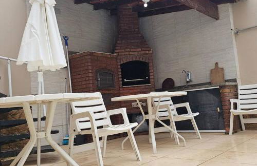 Belíssima Casa a Beira Mar com Piscina Aquecida Cobrado a Parte, 5 Quartos com Ar Condicionado, Amplo Salão de Jogos com Mesas de Bilhar e Pebolim, Amplo Espaço Externo com Churrasqueira em Deck Gourmet Coberto frente a Piscina,Tudo isso á Beira Mar - Photo 21