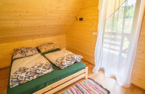 Domki nad rzeką w Komańczy - Foto 26