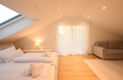 Liboria I Stylische Maisonette Wohnung Alpenblick I 4min zum See - Foto 5