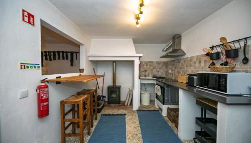 Cá Ficamos - T1 Hortacasa Portugal - Foto 5