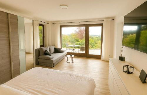 Modernes Apartment mit 180° Bergblick - Photo 2
