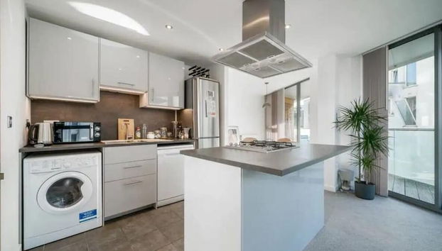 JOIVY Delightful 1BR flat w/ balcony - Foto 4, Cocina privada