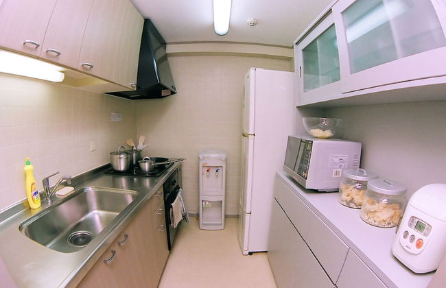 Beijing Jiuxian Apartment - Foto 7