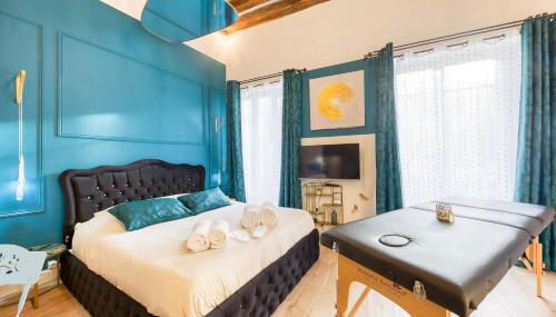 Suite bien être - jacuzzi et sauna / love room - Photo 5