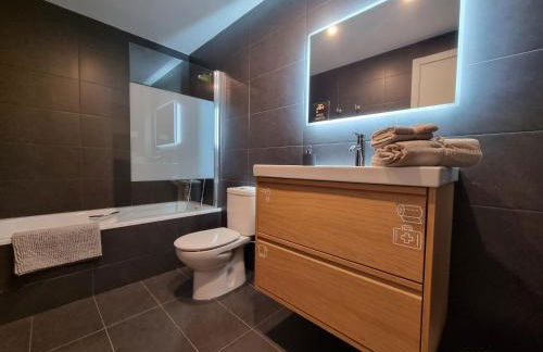 QEhome - confort, parking y cargador EV en el centro de Manresa - Photo 17