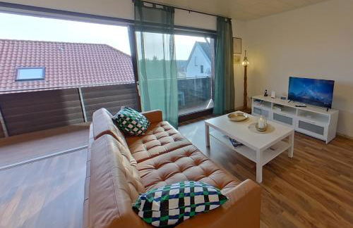 Apartment in Hanglage mit Garten und Balkon - Foto 1