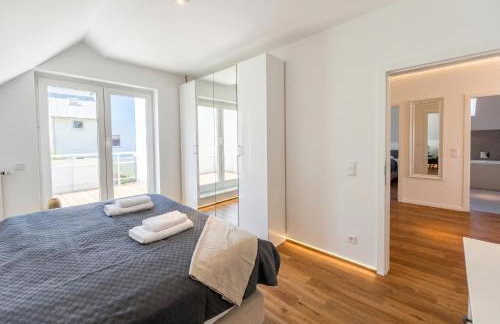 2 Schlafzimmer, Offene Küche, Balkon und Terrasse - moderne 90qm in ruhiger, zentraler Lage - nur 500m bis zum Strand - Foto 15