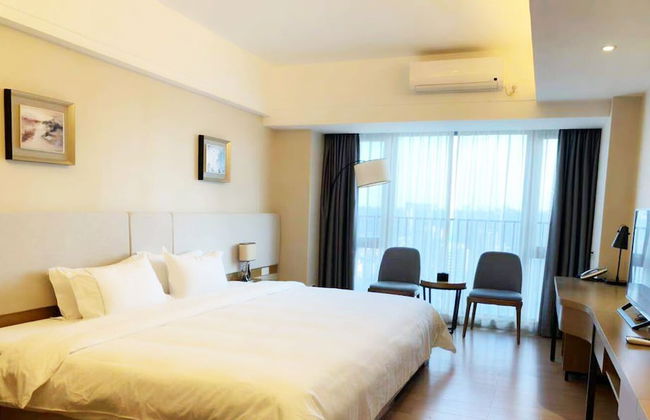 Yuwa Serviced ApartHotel - Photo 37