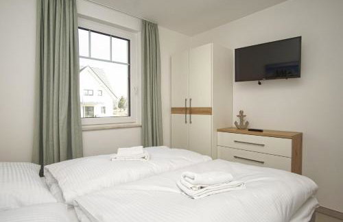 Rex Rugia FeWo12-2 strandnah,Terrasse,Sauna,Pool - Photo 23