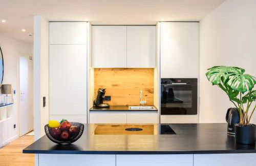 OrangeHome Design Apartment zwischen See & Zentrum - Foto 2