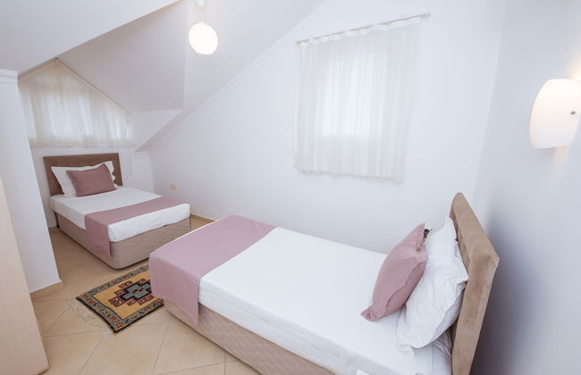 Infinity Olympia Apartments - Photo 3