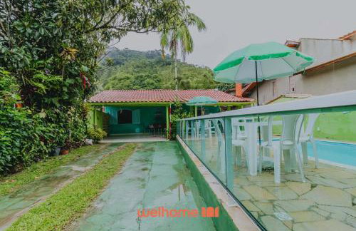 Casa em Ubatuba com piscina a 10 min da praia - Foto 4