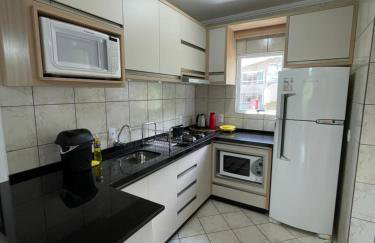 Lindo Apto com suíte perto da praia, no centro de Bombinhas - Photo 13