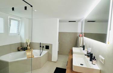 Luxuriöse & stilvolle Wohnung mit Spa-Bad, Home-Office & Fitnessbereich - Foto 14