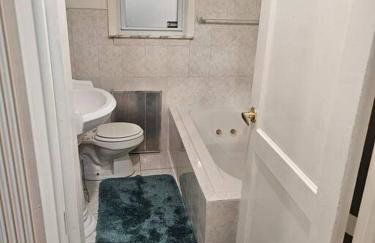 Comfy Getaway minutes from UBS Arena - Photo 18