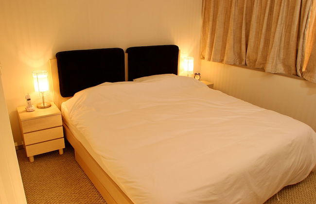 Beijing Jiuxian Apartment - Foto 3