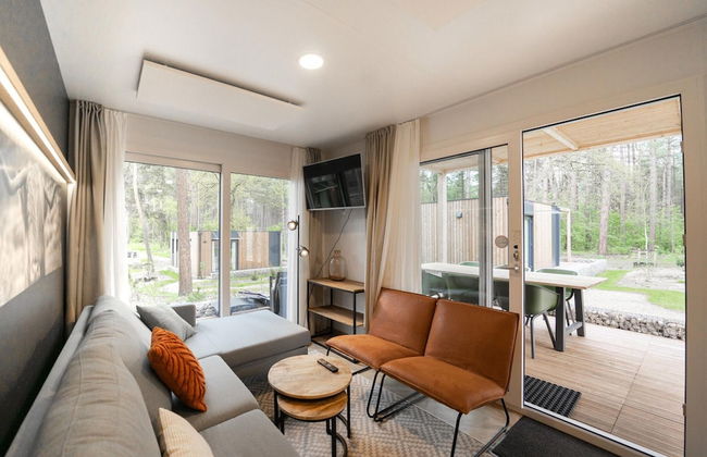 Chalet With air Conditioning on a Holiday Park - Foto 8