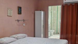 Aconchego da Marci Grande quarto confortável - Foto 3