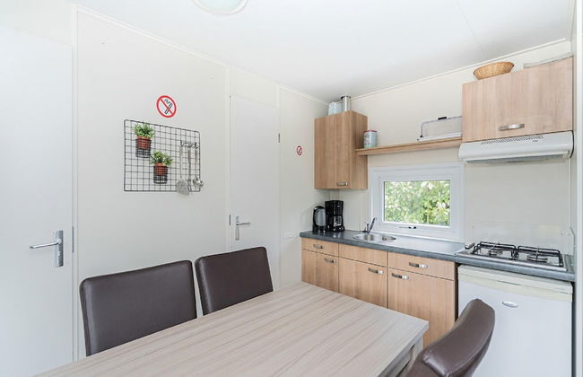 Chalet in Holiday Park With Private Terrace - Photo 8